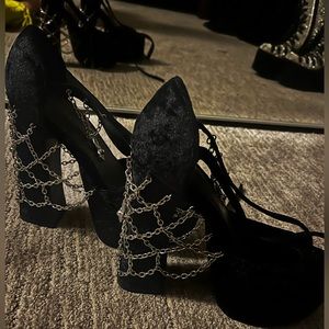 Limited edition black strap up wedge heals